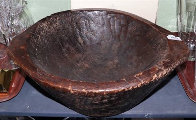 Lot 455 - ~ A 19th century treen circular two handled bowl, diameter 48cm