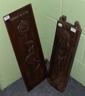 Lot 459 - ~ A Medieval carved oak figural section of timber, 56cm long; with another panel (2)