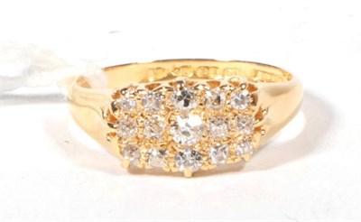 Lot 483 - An 18ct gold diamond three row cluster ring, finger size N, 3.7g