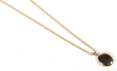 Lot 488 - A locket pendant on a 9 carat gold fancy link chain, length 60cm