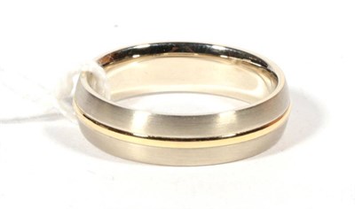 Lot 491 - An 18ct brushed gold band ring, finger size 9.3g