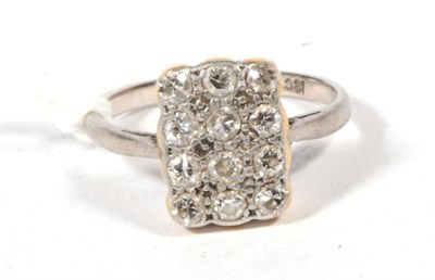 Lot 519 - ~ A diamond plaque ring, a rectangular plaque pave set with round brilliant cut diamonds, total...