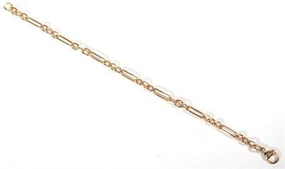 Lot 525 - A 9 carat gold long and short link bracelet, length 19cm