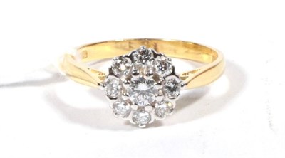 Lot 543 - An 18ct gold diamond cluster ring, total estimated diamond weight 0.60 carat approximately,...