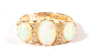 Lot 546 - An 18ct gold opal and diamond ring, finger size N, 5.7g