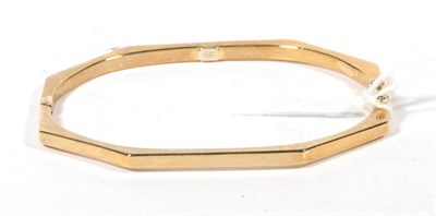 Lot 547 - A 9ct gold octagonal bangle, 10.2g