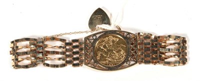 Lot 554 - Elizabeth II 1981 sovereign, loose mount in a 9 carat gold bracelet, 22.8g gross