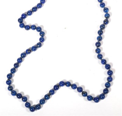 Lot 557 - A lapis lazuli bead necklace, length 80cm approximately