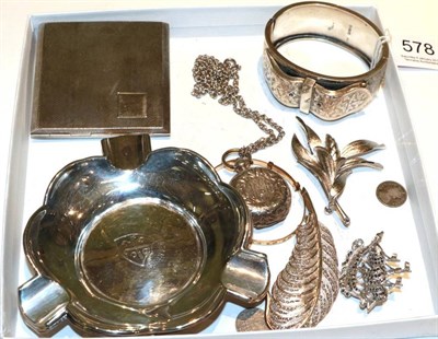 Lot 578 - A Victorian silver cuff bangle, various brooches, a silver engine turned power compact, two...