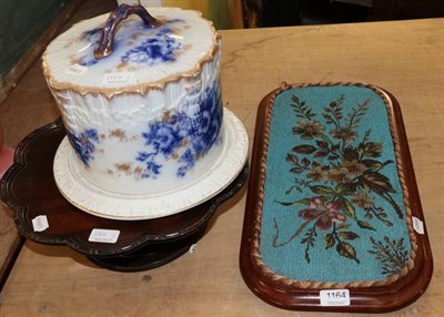 Lot 1164 - A mahogany lazy Susan; a stilton dish; and a beadwork stand