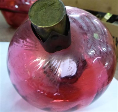 Lot 1165 - A pink satin glass oil lamp and shade; together with other lamps and plates