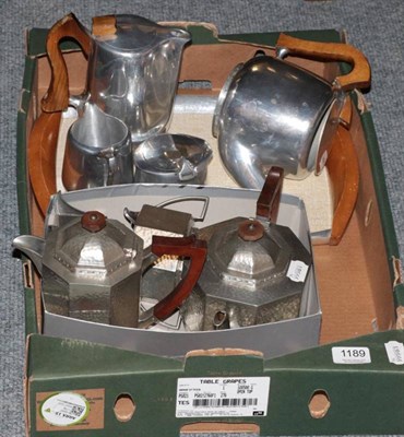 Lot 1189 - Four piece picquot ware tea service with matching tray; and a four piece planished pewter tea...