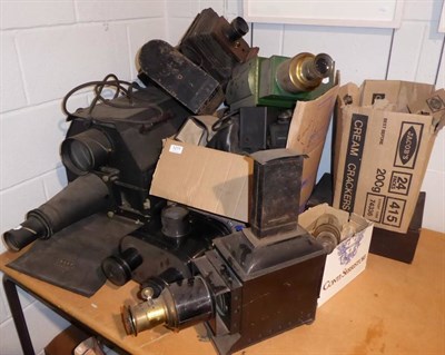 Lot 1211 - ~ A collection of assorted camera including: tin plate examples; pathoscope; a Ross of London metal