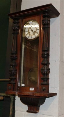 Lot 1289 - ~ A 19th century French vineyard clock, with mother-of-pearl inlay, Roman dial, twin-train...