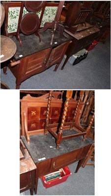 Lot 1333 - ~ A late Victorian mahogany washstand with a pink and white marble top above two cupboard...