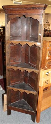 Lot 1343 - Oak four-tier free standing corner cupboard