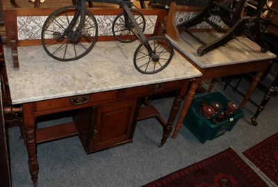 Lot 1352 - ~ A late Victorian satin walnut washstand with grey marble top and tiled back with two drawers...