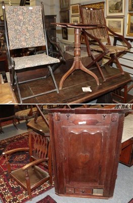 Lot 1353 - ~ A George III mahogany flip top tripod table, raised on a turned ash support with three...