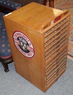 Lot 1370 - ~ An early 20th century light oak machine twin sylko table top display cabinet for cotton reels...