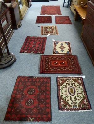 Lot 1383 - ~ A collection of hand-woven Oriental mats, together with an Afghan runner (9)