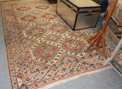 Lot 1388 - Bergama Carpet, West Turkey, the ivory lattice field enclosed by polychrome borders, 320cm by 196cm