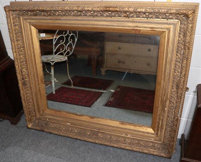 Lot 1399 - ~ A Victorian gilt and gesso mirror, 3rd quarter 19th century, with acanthus decorated frame...