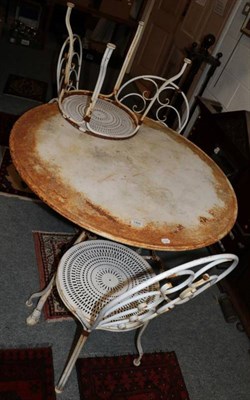 Lot 1400 - A metal garden table and four chairs