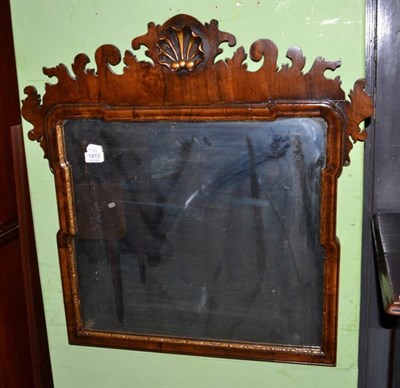 Lot 1413 - George II style walnut and parcel gilt mirror with moulded frame, 73cm high