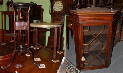 Lot 1430 - A glazed corner cupboard; a wig stand; and a brass table