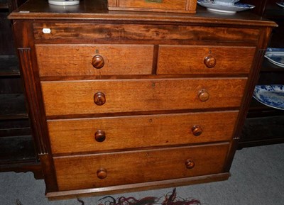 Lot 1447 - ~ A mid 19th century oak and mahogany five drawer straight fronted chest of two short over...