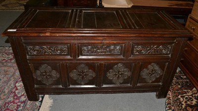 Lot 1460 - A 17th century oak chest with carved panels