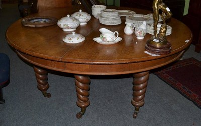 Lot 1467 - ~ A Victorian circular oak extending dining table, circa 1870, raised on six spiral turned legs...