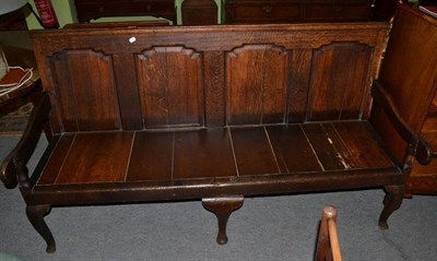 Lot 1469 - George III oak settle with four fielded panels, 183cm wide