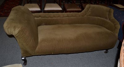 Lot 1477 - ~ An Edwardian two seater sofa, recovered in corduroy fabric, raised on ebonised legs with castors