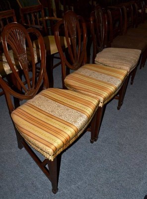 Lot 1487 - Set of three Heppelwhite period mahogany dining chairs