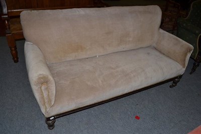 Lot 1495 - ~ A Victorian mahogany framed two seater sofa, upholstered in grey velvet with rounded arms and...