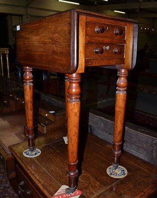 Lot 1505 - Early 19th century mahogany drop-leaf table with two real and two sham drawers, 72cm high