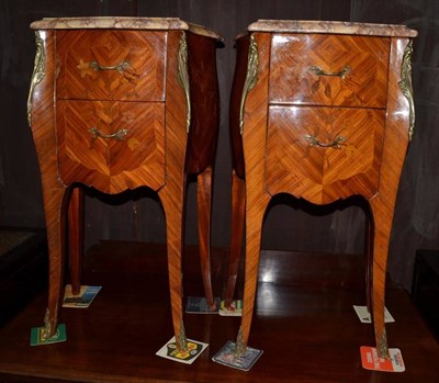 Lot 1517 - A pair of marble top inlaid kingwood bedside cabinets