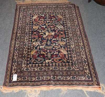 Lot 1546 - Balouch rug, Afghan Frontier, the field with anthropomorphic and zoomorphic figures within multiple