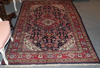 Lot 1549 - Hamadan rug, Iranian Kurdistan, the indigo Herati field with central medallion framed by...