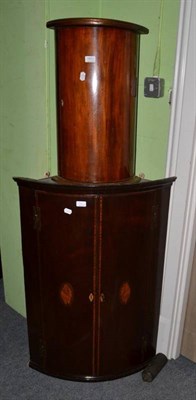 Lot 1552 - George III mahogany bow fronted hanging corner cupboard, 100cm high; together with a later...