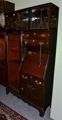 Lot 1553 - A late 19th century combination bureau/display cabinet