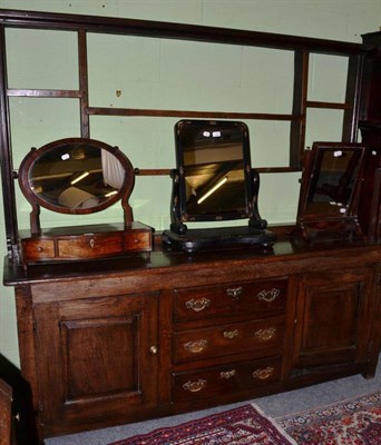 Lot 1558 - An 18th century oak dresser with associated rack, 195cm wide