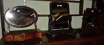 Lot 1560 - Victorian ebonised toilet mirror; George III example with serpentine shaped base; and George...