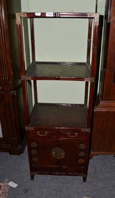 Lot 1566 - A 20th century Oriental whatnot with base cupboard