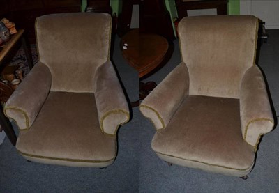 Lot 1569 - Two Victorian armchairs upholstered in green velvet