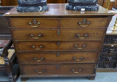 Lot 1500 - A George III mahogany secretaire chest, late 18th century with a three as one deep drawer,...