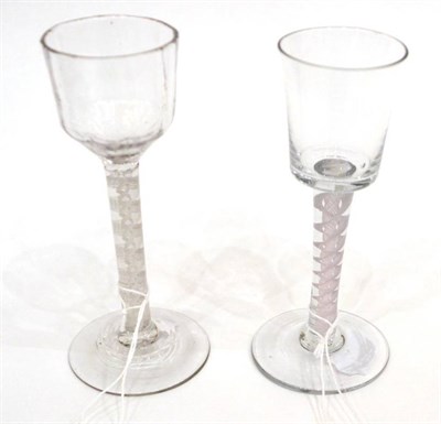 Lot 210 - A Wine Glass, circa 1750, the vertically fluted ogee bowl on an opaque twist stem, 15.5cm high; and
