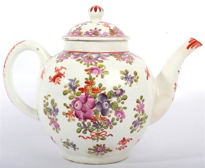 Lot 223 - A Lowestoft Porcelain Teapot and Cover, circa 1780, painted in Curtis style with flowersprays...