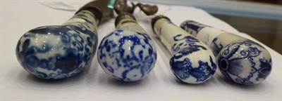 Lot 231 - A Bow Porcelain Knife Handle, circa 1760, painted in underglaze blue with scrolls and foliage,...
